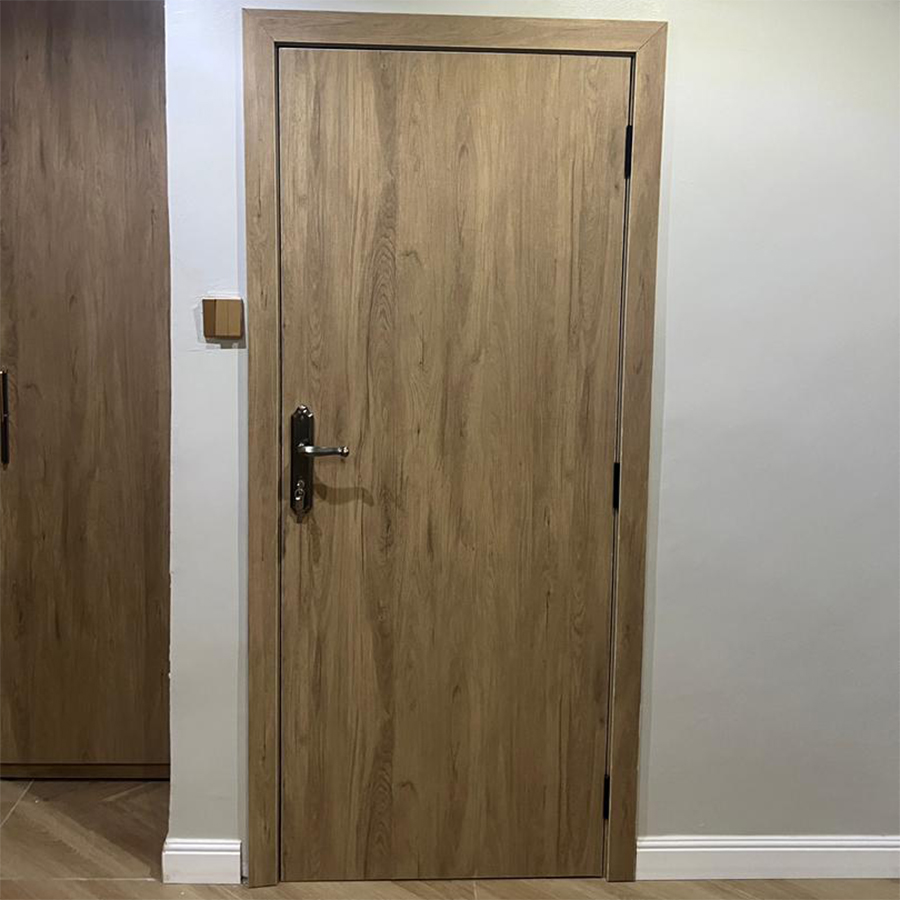 Custom wooden interior door installed in Lagos home